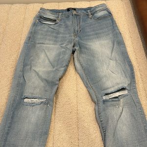 Fashion Nova 34x34 Light Blue Distressed Jeans.